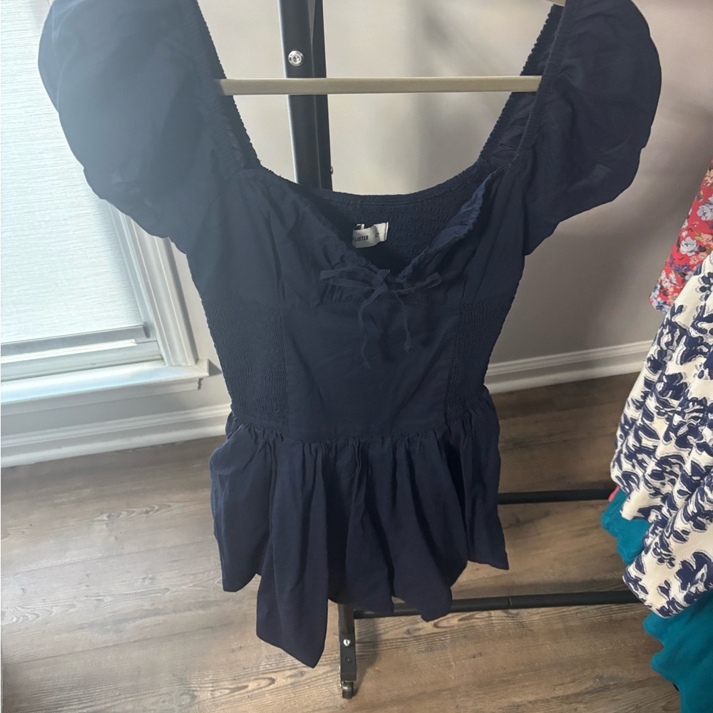 Elegant Navy Blue Women's bubble bottom dress with ruffled sleeve